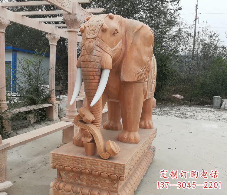 河南鼻卷如意的大象晚霞红门口镇宅石雕