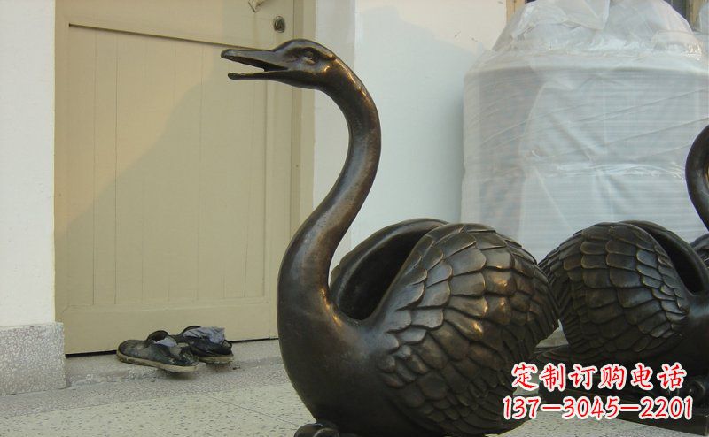 河南绝美铜板雕刻天鹅雕塑