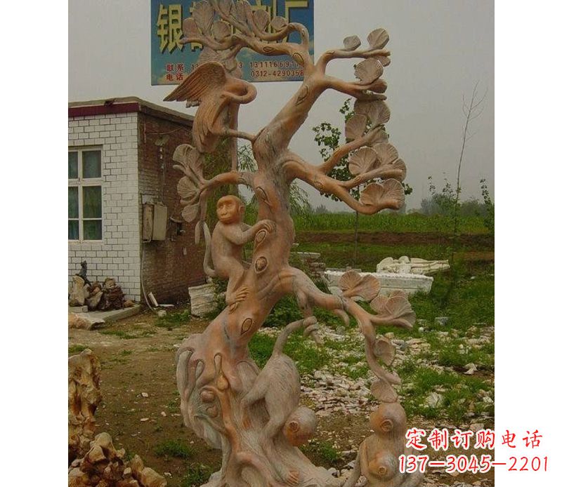 河南猴子上树摘桃石雕