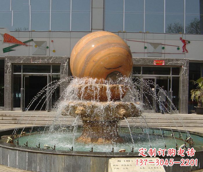 河南石来运转球晚霞红风水球石雕