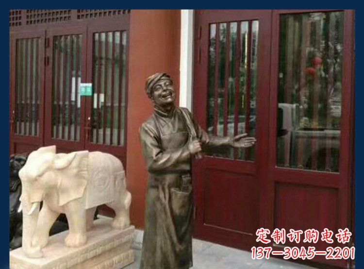 河南铜雕店小二酒店迎宾人物雕塑