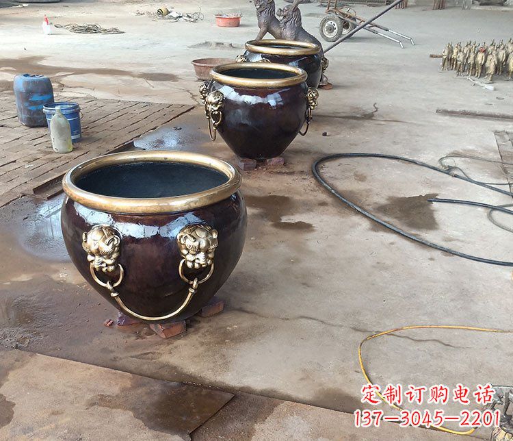 河南铜雕故宫狮子头水缸雕塑