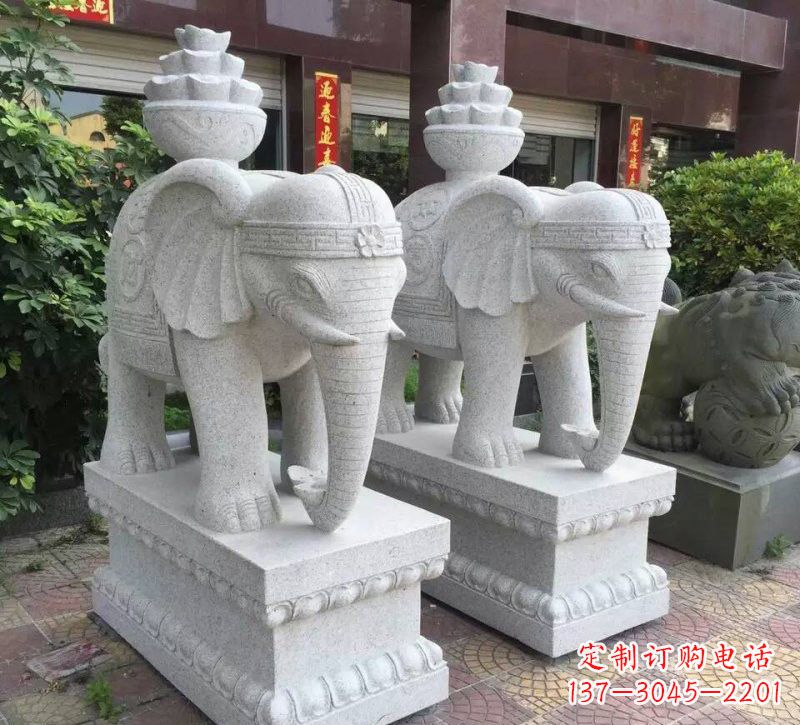 河南驮元宝的大象石雕
