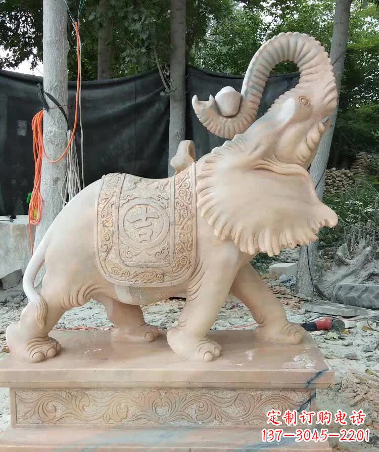 河南晚霞红卷元宝大象雕塑