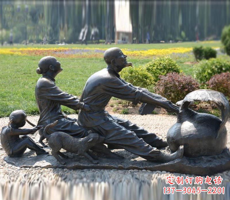 河南祖孙三人拔萝卜铜雕